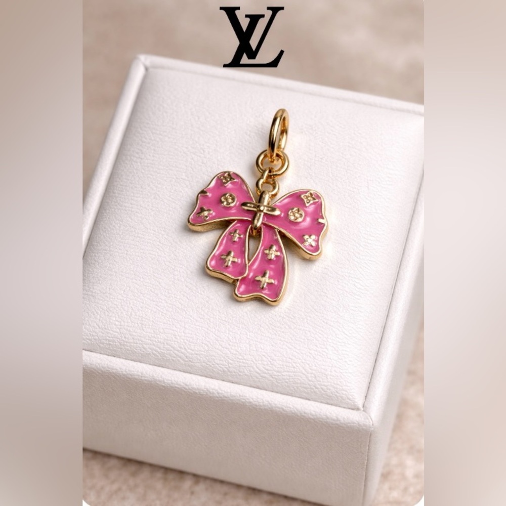 Louis Vuitton stamped Pink and Gold Bow Pendant charm